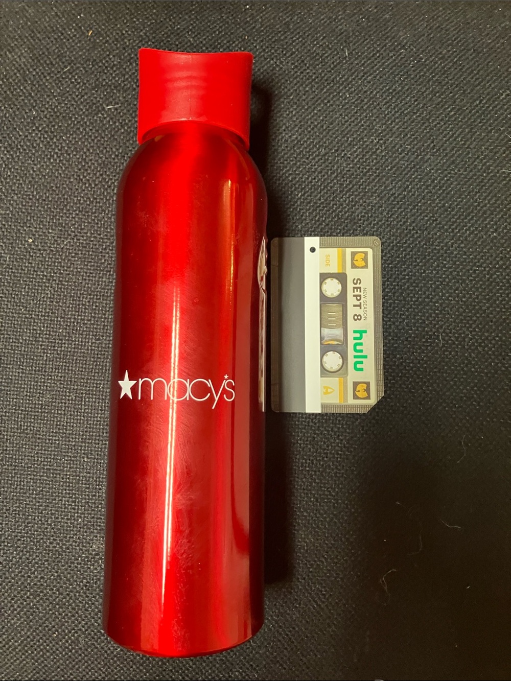 Macy's Shiny Red Aluminum Travel Bottle